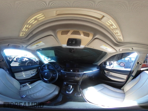 2015 BMW 3 Series 328i with VIN WBA3C1C50FK124300, listed as a IAAI auction lot 40112372 with 142,591 mi miles and . Bid and sale history available at carsss.com. Image 18.