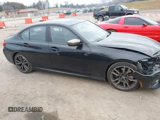 2020 BMW 3 Series M340i with VIN WBA5U7C02LAF54184, listed as a IAAI auction lot 41490697 with 57,363 mi miles. Bid and sale history available at carsss.com. Image 13.