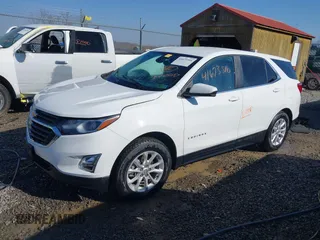 2021 Chevrolet Equinox LT with VIN 3GNAXUEV1MS163922, listed as a IAAI auction lot 41673516 with 61,408 mi miles and . Bid and sale history available at carsss.com. Image 2.