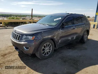 2014 Jeep Grand Cherokee Limited with VIN 1C4RJFBT6EC410774, listed as a Copart auction lot 58011005 with 166,506 mi miles and Salvage title. Bid and sale history available at DreamBid. Image 1.