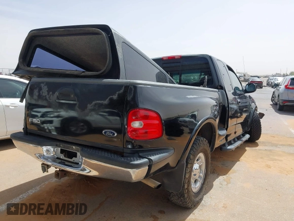 1999 Ford F-150 XL with VIN 1FTRX08L3XKB12260, listed as a IAAI auction lot 42244781 with Not provided miles and . Bid and sale history available at DreamBid. Image 4.