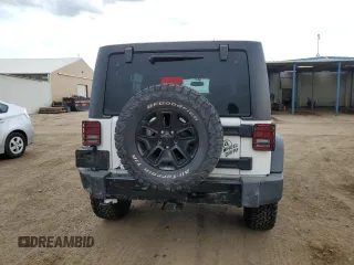 2016 Jeep Wrangler Unlimited Sport with VIN 1C4BJWDG4GL129559, listed as a Copart auction lot 57851285 with 148,022 mi miles and Salvage title. Bid and sale history available at DreamBid. Image 6.