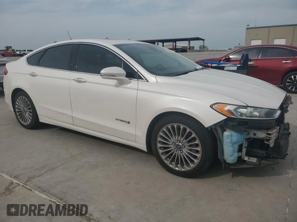 2013 Ford Fusion Titanium Hybrid с VIN 3FA6P0RU3DR282013, выставлен на аукционе Copart как лот 53651595 с пробегом 133 214 миль миль и Списание • Salvage title. История ставок и продаж доступна на DreamBid. Изображение 4.
