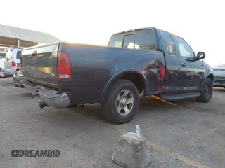 1999 Ford F-150 XL with VIN 1FTRX17L3XKB32547, listed as a IAAI auction lot 41331882 with Not Provided miles. Bid and sale history available at carsss.com. Image 4.