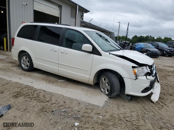 2012 Dodge Grand Caravan SXT with VIN 2C4RDGCG0CR122980, listed as a Copart auction lot 60617254 with 245,660 mi miles and Salvage Title. Bid and sale history available at carsss.com. Image 4.