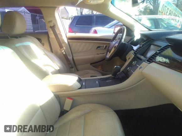 2014 Ford Taurus Limited with VIN 1FAHP2F80EG101504, listed as a IAAI auction lot 40974783 with 177,522 mi miles. Bid and sale history available at carsss.com. Image 5.
