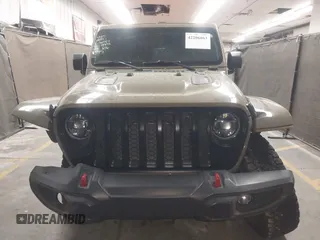 2020 Jeep Gladiator Rubicon z VIN 1C6JJTBGXLL178893, wystawiony jako IAAI lot #42206863 z przebiegiem 29 138 mil mil oraz . Historia ofert i sprzedaży dostępna na DreamBid. Obrazek 13.