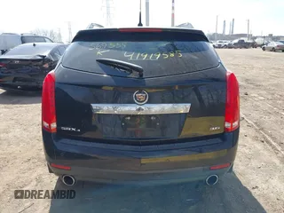 2012 Cadillac SRX Performance Collection z VIN 3GYFNEE31CS569555, wystawiony jako IAAI lot #41919585 z przebiegiem 126 991 mil mil oraz . Historia ofert i sprzedaży dostępna na DreamBid. Obrazek 16.