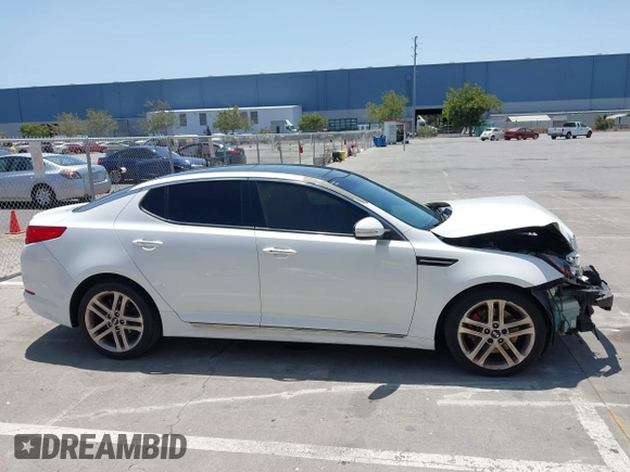 2013 Kia Optima SX with VIN 5XXGR4A6XDG106409, listed as a IAAI auction lot 42525630 with 213,722 mi miles and . Bid and sale history available at DreamBid. Image 14.