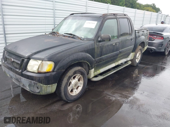 2003 Ford Explorer Sport Trac XLS z VIN 1FMZU67E73UC26464, wystawiony jako IAAI lot #42802849 z przebiegiem 228 139 mil mil oraz . Historia ofert i sprzedaży dostępna na DreamBid. Obrazek 2.