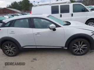 2016 Mazda CX-3 Grand Touring with VIN JM1DKFD7XG0132084, listed as a IAAI auction lot 41004954 with 70,476 mi miles. Bid and sale history available at carsss.com. Image 13.