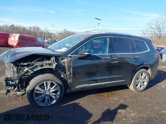 2023 Cadillac XT6 FWD Premium Luxury with VIN 1GYKPCRS1PZ105964, listed as a IAAI auction lot 41525039 with 70,603 mi miles and . Bid and sale history available at DreamBid. Image 20.