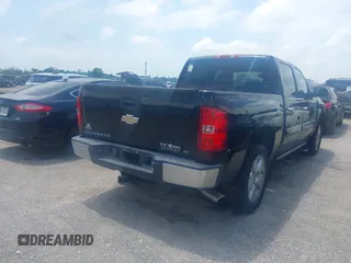 2011 Chevrolet Silverado 1500 LT with VIN 3GCPCSE06BG391860, listed as a IAAI auction lot 42077801 with 214,709 mi miles and . Bid and sale history available at DreamBid. Image 4.