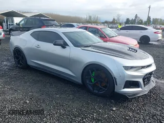 2017 Chevrolet Camaro 1SS z VIN 1G1FF1R7XH0176640, wystawiony jako IAAI lot #41911058 z przebiegiem 74 093 mil mil oraz . Historia ofert i sprzedaży dostępna na DreamBid. Obrazek 1.