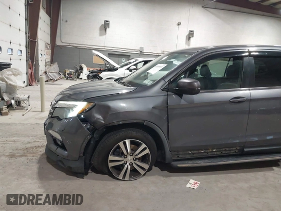 2016 Honda Pilot EX-L with VIN 5FNYF6H5XGB010230, listed as a IAAI auction lot 41858811 with 194,119 mi miles. Bid and sale history available at carsss.com. Image 6.