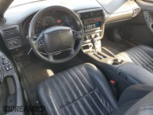 2001 Chevrolet Camaro Z28 z VIN 2G1FP22G712124948, wystawiony jako Copart lot #76083164 z przebiegiem 21 108 mil mil oraz Szkoda całkowita • Salvage title. Historia ofert i sprzedaży dostępna na DreamBid. Obrazek 8.