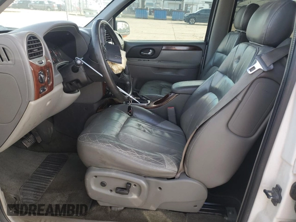 2003 GMC Envoy XL SLE with VIN 1GKET16S532130221, listed as a Copart auction lot 87108784 with 217,821 mi miles and Salvage Title. Bid and sale history available at carsss.com. Image 7.