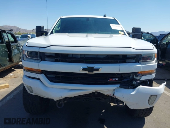 2016 Chevrolet Silverado 1500 LT with VIN 3GCUKREC5GG369915, listed as a IAAI auction lot 42082155 with 137,671 mi miles and . Bid and sale history available at DreamBid. Image 6.