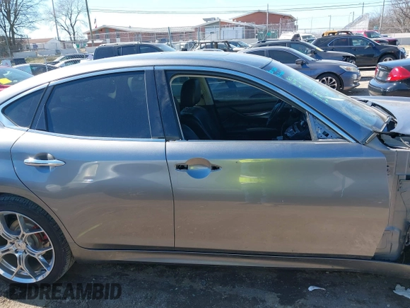 2018 Infiniti Q70 Luxe with VIN JN1BY1AR6JM220065, listed as a IAAI auction lot 41665033 with 135,905 mi miles and . Bid and sale history available at DreamBid. Image 14.