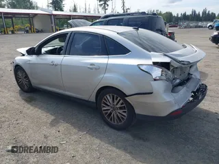 2016 Ford Focus Titanium with VIN 1FADP3J20GL238914, listed as a IAAI auction lot 42338977 with 126,276 mi miles and . Bid and sale history available at DreamBid. Image 3.