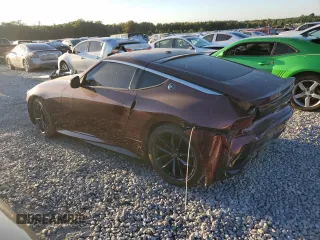 2023 Nissan Z Performance z VIN JN1BZ4BH8PM311058, wystawiony jako Copart lot #74943134 z przebiegiem 26 419 mil mil oraz Czysty tytuł • Clean title. Historia ofert i sprzedaży dostępna na DreamBid. Obrazek 2.