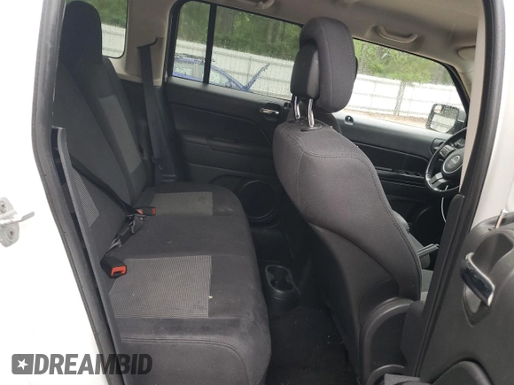 2011 Jeep Patriot Sport z VIN 1J4NT1GBXBD289100, wystawiony jako Copart lot #58624415 z przebiegiem 119 710 mil mil oraz Czysty tytuł • Clean title. Historia ofert i sprzedaży dostępna na DreamBid. Obrazek 10.