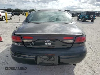 1998 Ford Taurus z VIN 1FAFP52S7WA158927, wystawiony jako Copart lot #45677185 z przebiegiem 68 722 mil mil oraz Szkoda całkowita • Salvage title. Historia ofert i sprzedaży dostępna na DreamBid. Obrazek 6.