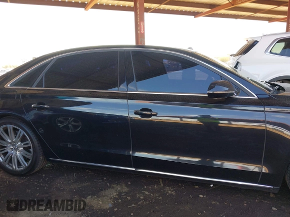 2011 Audi A8 with VIN WAURVAFD1BN027915, listed as a IAAI auction lot 41635275 with 95,143 mi miles and . Bid and sale history available at DreamBid. Image 14.