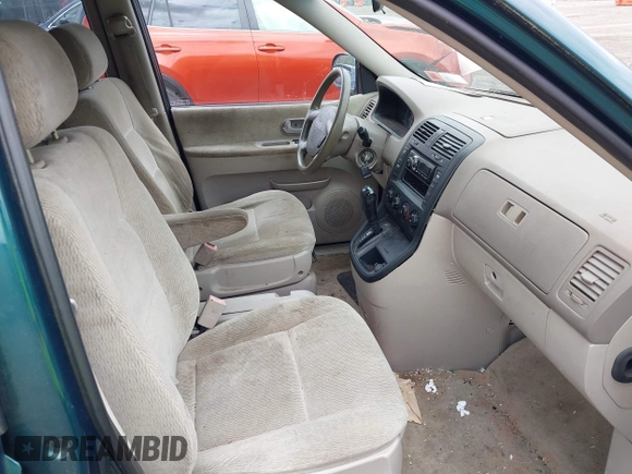 2005 Kia Sedona LX with VIN KNDUP132256743425, listed as a IAAI auction lot 42183166 with 133,719 mi miles. Bid and sale history available at carsss.com. Image 5.