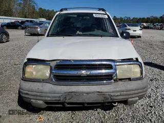 2003 Chevrolet Tracker z VIN 2CNBE13C736912038, wystawiony jako Copart lot #80422844 z przebiegiem 242 512 mil mil oraz Szkoda całkowita • Salvage title. Historia ofert i sprzedaży dostępna na DreamBid. Obrazek 5.