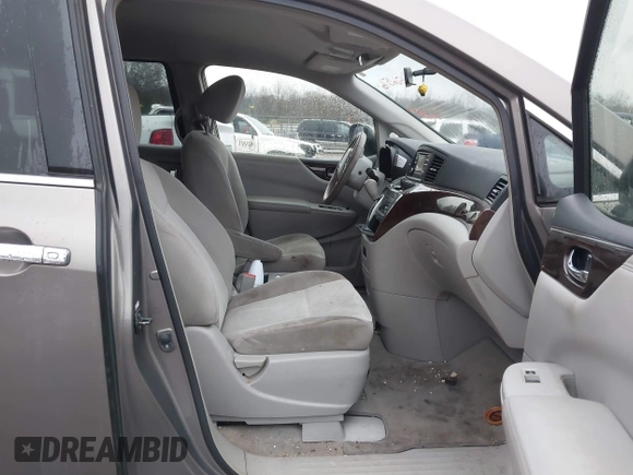 2014 Nissan Quest S with VIN JN8AE2KP0E9107133, listed as a IAAI auction lot 41561516 with 227,656 mi miles and . Bid and sale history available at DreamBid. Image 5.