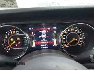 2021 Jeep Wrangler Unlimited Sport Altitude with VIN 1C4HJXDG2MW791599, listed as a IAAI auction lot 41235427 with 47,220 mi miles and . Bid and sale history available at DreamBid. Image 7.