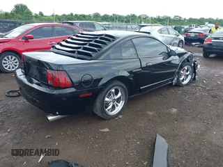 2001 Ford Mustang GT Deluxe with VIN 1FAFP42X01F256120, listed as a IAAI auction lot 42446560 with Not provided miles and . Bid and sale history available at DreamBid. Image 4.