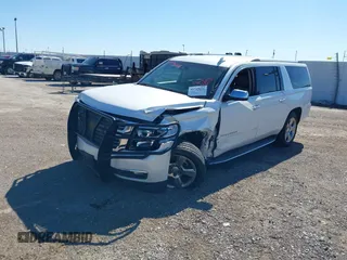 2017 Chevrolet Suburban Premier z VIN 1GNSCJKC7HR142082, wystawiony jako IAAI lot #41749026 z przebiegiem 152 415 mil mil oraz . Historia ofert i sprzedaży dostępna na DreamBid. Obrazek 14.