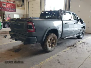 2020 Ram 1500 Rebel with VIN 1C6SRFLT0LN162491, listed as a IAAI auction lot 41841159 with 58,265 mi miles and . Bid and sale history available at DreamBid. Image 4.