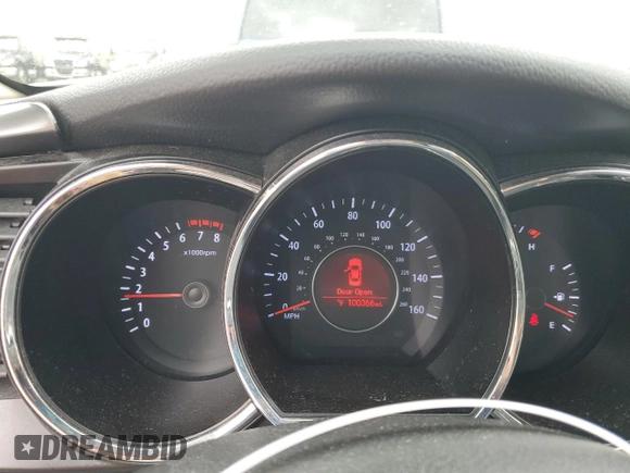 2013 Kia Optima LX z VIN KNAGM4A79D5327301, wystawiony jako Copart lot #55595565 z przebiegiem 100 366 mil mil oraz Szkoda całkowita • Salvage title. Historia ofert i sprzedaży dostępna na DreamBid. Obrazek 9.