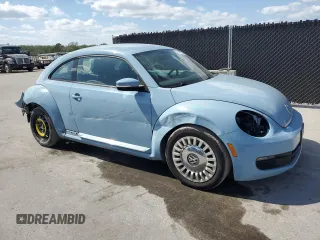 2014 Volkswagen Beetle 2.5L w/Sun with VIN 3VWJP7AT8EM633476, listed as a Copart auction lot 53447715 with 120,074 mi miles and Salvage Title. Bid and sale history available at DreamBid. Image 4.