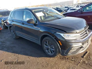 2023 Volkswagen Tiguan SE with VIN 3VVMB7AX8PM032557, listed as a IAAI auction lot 41585975 with 28,706 mi miles and . Bid and sale history available at DreamBid. Image 1.