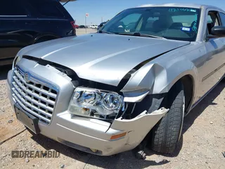 2007 Chrysler 300 with VIN 2C3KA43RX7H664582, listed as a IAAI auction lot 42106297 with 141,866 mi miles and . Bid and sale history available at DreamBid. Image 6.