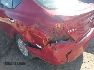 2014 Nissan Versa SV with VIN 3N1CN7AP6EK462276, listed as a IAAI auction lot 41533459 with 138,719 mi miles. Bid and sale history available at carsss.com. Image 6.