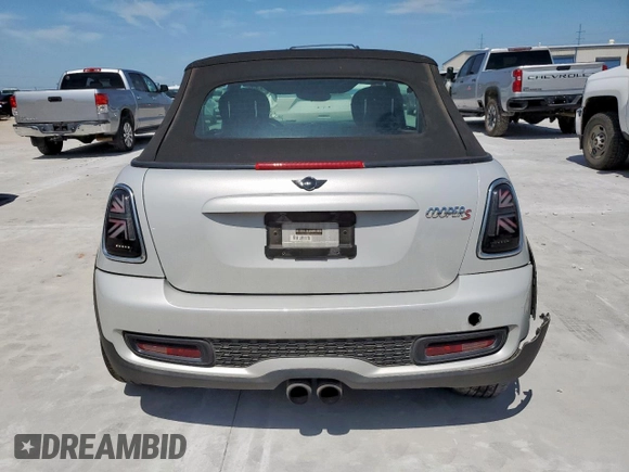 2013 MINI Convertible S с VIN WMWZP3C57DT705259, выставлен на аукционе Copart как лот 59954795 с пробегом 132 988 миль миль и Списание • Salvage title. История ставок и продаж доступна на DreamBid. Изображение 6.