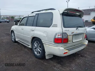 2000 Lexus LX 470 z VIN JT6HT00W8Y0096929, wystawiony jako IAAI lot #42316574 z przebiegiem 227 839 mil mil oraz . Historia ofert i sprzedaży dostępna na DreamBid. Obrazek 3.