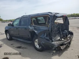 2012 Chevrolet Suburban LT with VIN 1GNSKJE77CR298049, listed as a Copart auction lot 61171865 with 247,737 mi miles and Salvage title. Bid and sale history available at DreamBid. Image 2.