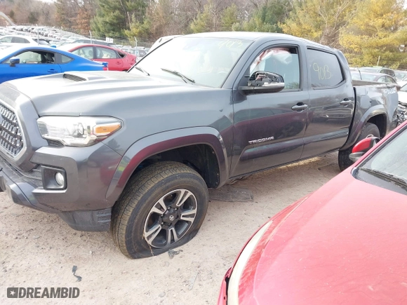 2019 Toyota Tacoma 4WD SR with VIN 3TMCZ5AN6KM199663, listed as a IAAI auction lot 41429013 with 73,574 mi miles. Bid and sale history available at carsss.com. Image 23.