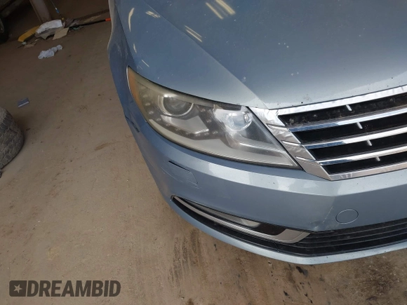 2013 Volkswagen CC Sport with VIN WVWBP7AN1DE567561, listed as a IAAI auction lot 42174906 with 157,827 mi miles. Bid and sale history available at carsss.com. Image 13.