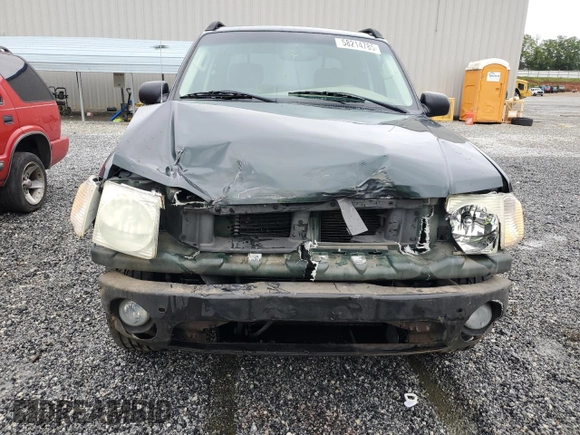 2004 Ford Explorer Sport Trac XLS with VIN 1FMZU67K04UA70503, listed as a Copart auction lot 58214785 with 195,688 mi miles and Salvage title. Bid and sale history available at DreamBid. Image 5.