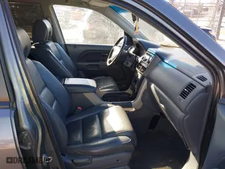 2008 Honda Pilot EX-L with VIN 5FNYF28518B006058, listed as a IAAI auction lot 41425424 with 230,006 mi miles. Bid and sale history available at carsss.com. Image 5.
