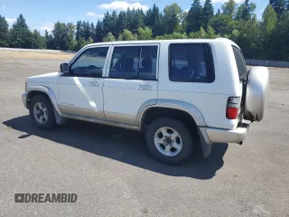 2000 Isuzu Trooper S with VIN JACDJ58X1Y7J12904, listed as a Copart auction lot 63835695 with 228,213 mi miles and Clean title. Bid and sale history available at DreamBid. Image 2.
