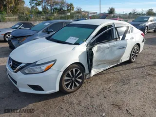 2018 Nissan Altima 2.5 SV with VIN 1N4AL3AP7JC235011, listed as a IAAI auction lot 41737494 with 76,330 mi miles. Bid and sale history available at carsss.com. Image 2.