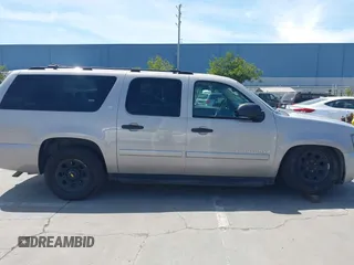 2007 Chevrolet Suburban LS with VIN 1GNFC16027J202168, listed as a IAAI auction lot 42100210 with Not Provided miles and . Bid and sale history available at DreamBid. Image 13.